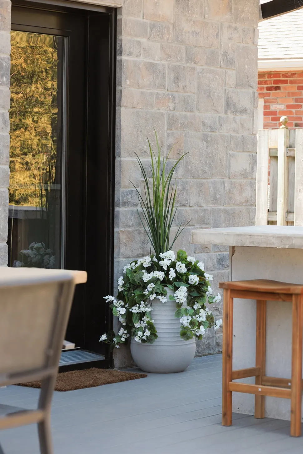 Artificial white geranium in a grey terrazzo beige pot, 55"