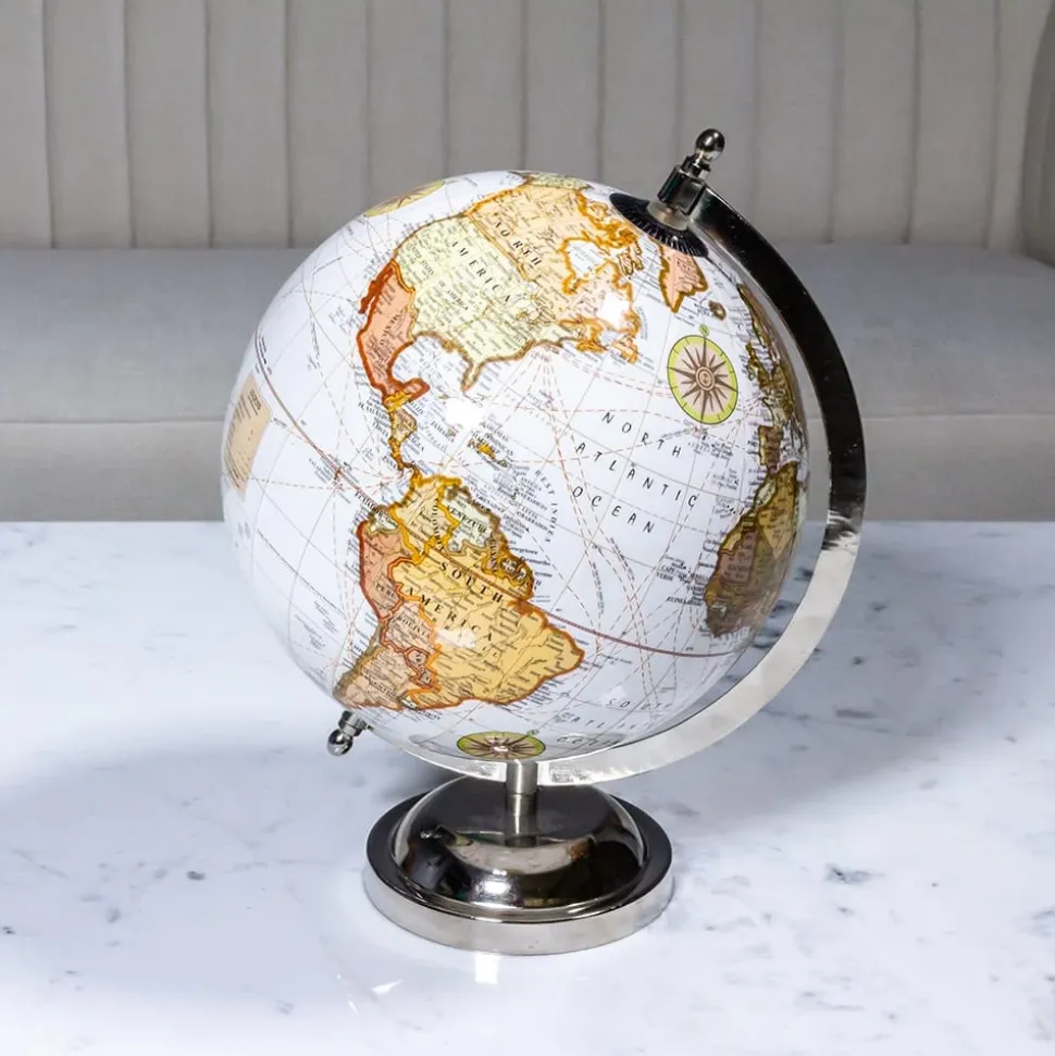 Brown and white earth globe on a silver stand, 8"