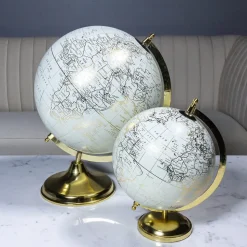 Cream earth globe on a gold stand, 12