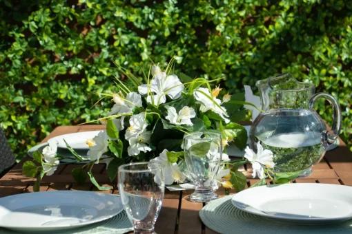 Outdoor artificial white hibiscus flower centerpiece, 14 x 14"