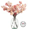 Pink cherry blossom bouquet in a vase