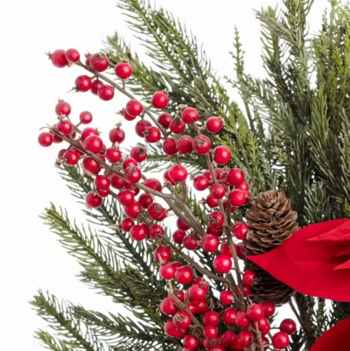 Red poinsettia traditional Christmas arrangement