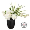 Small white flower bouquet in a black vase