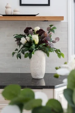 White and burgundy floral arrangement